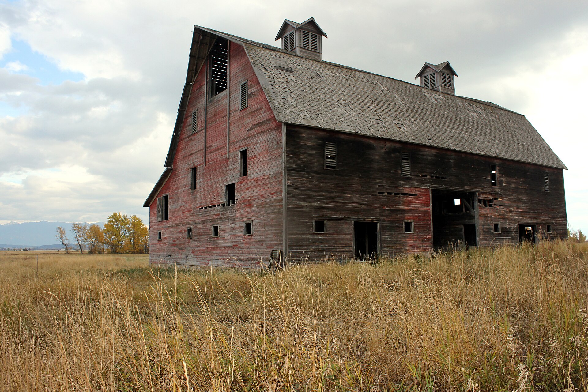 Weathered ranch barn under a big sky